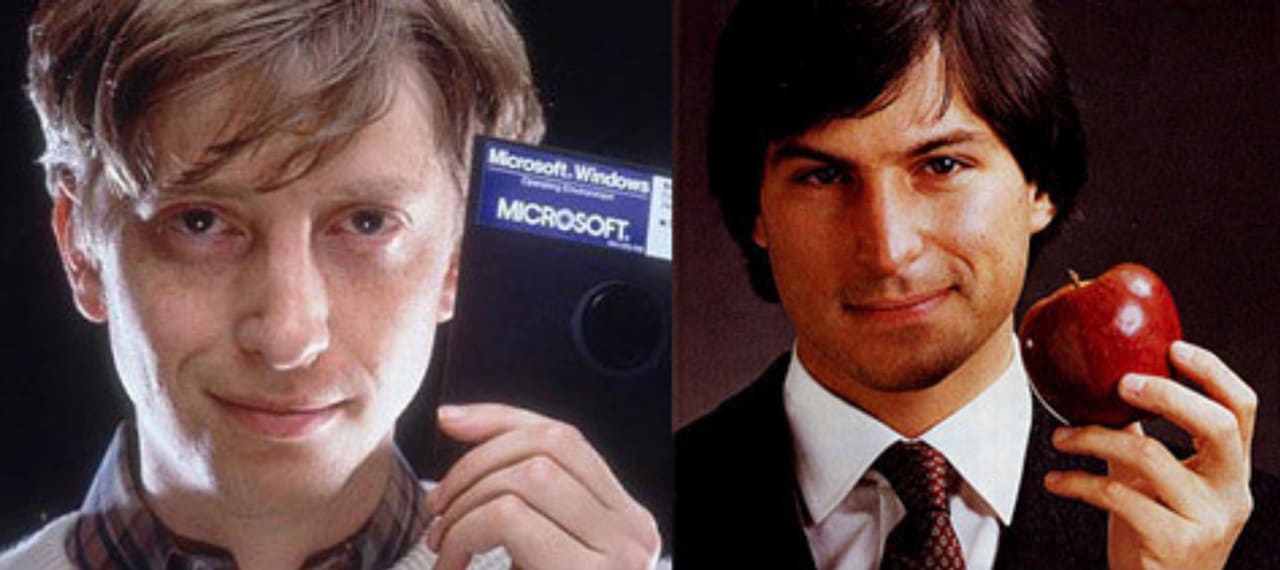photo of young Bill Gates holding a Microsoft floppy disk next to young Steve Jobs holding up an apple