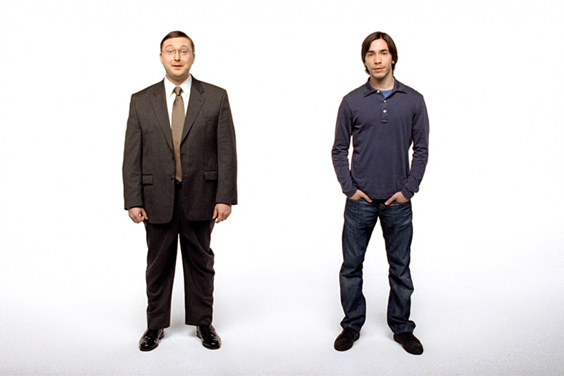 Video still of Im a Mac commercial with two men standing side by side on a white background
